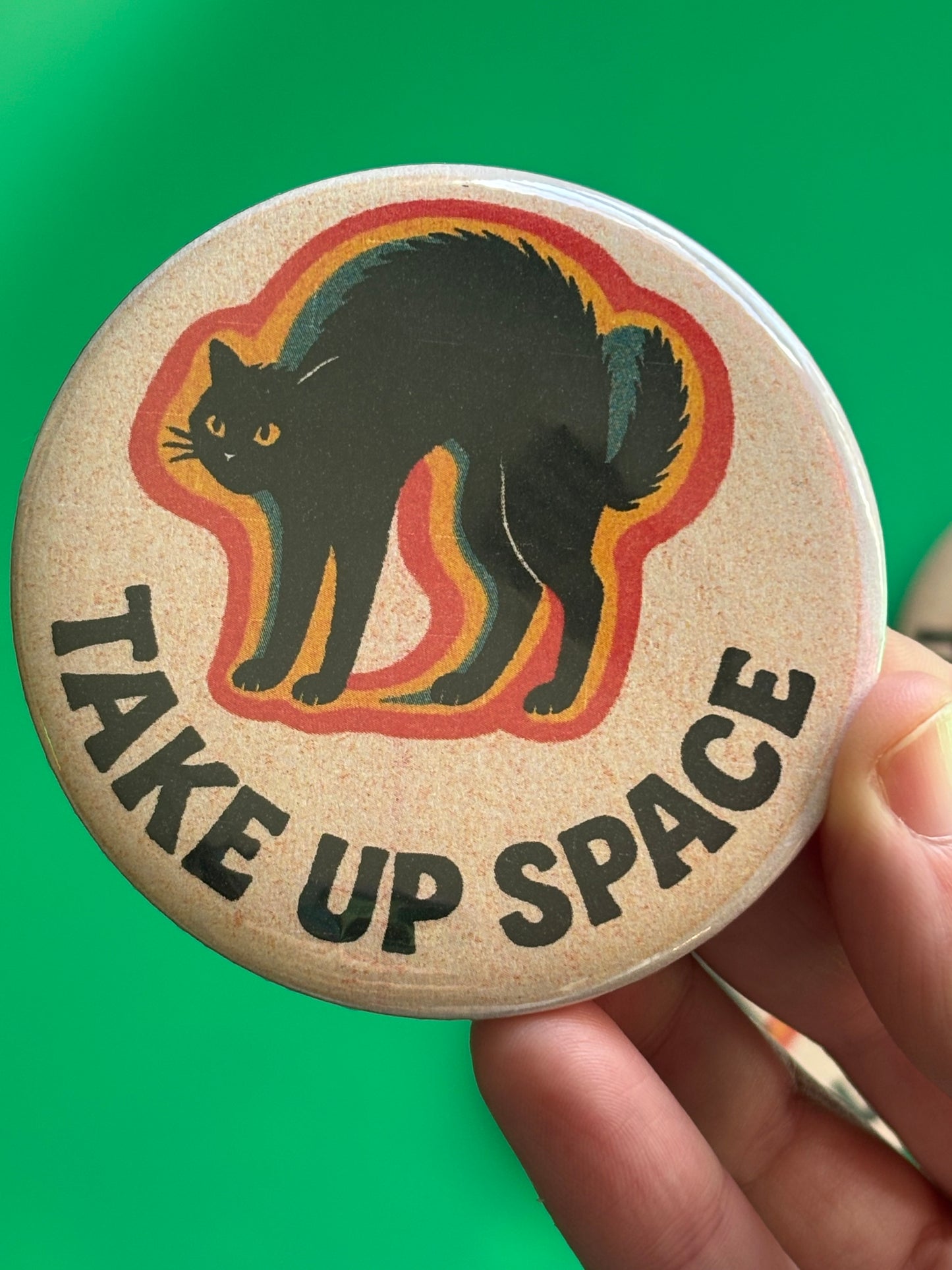 TAKE UP SPACE pinback button, 3 inches risograph style illustration