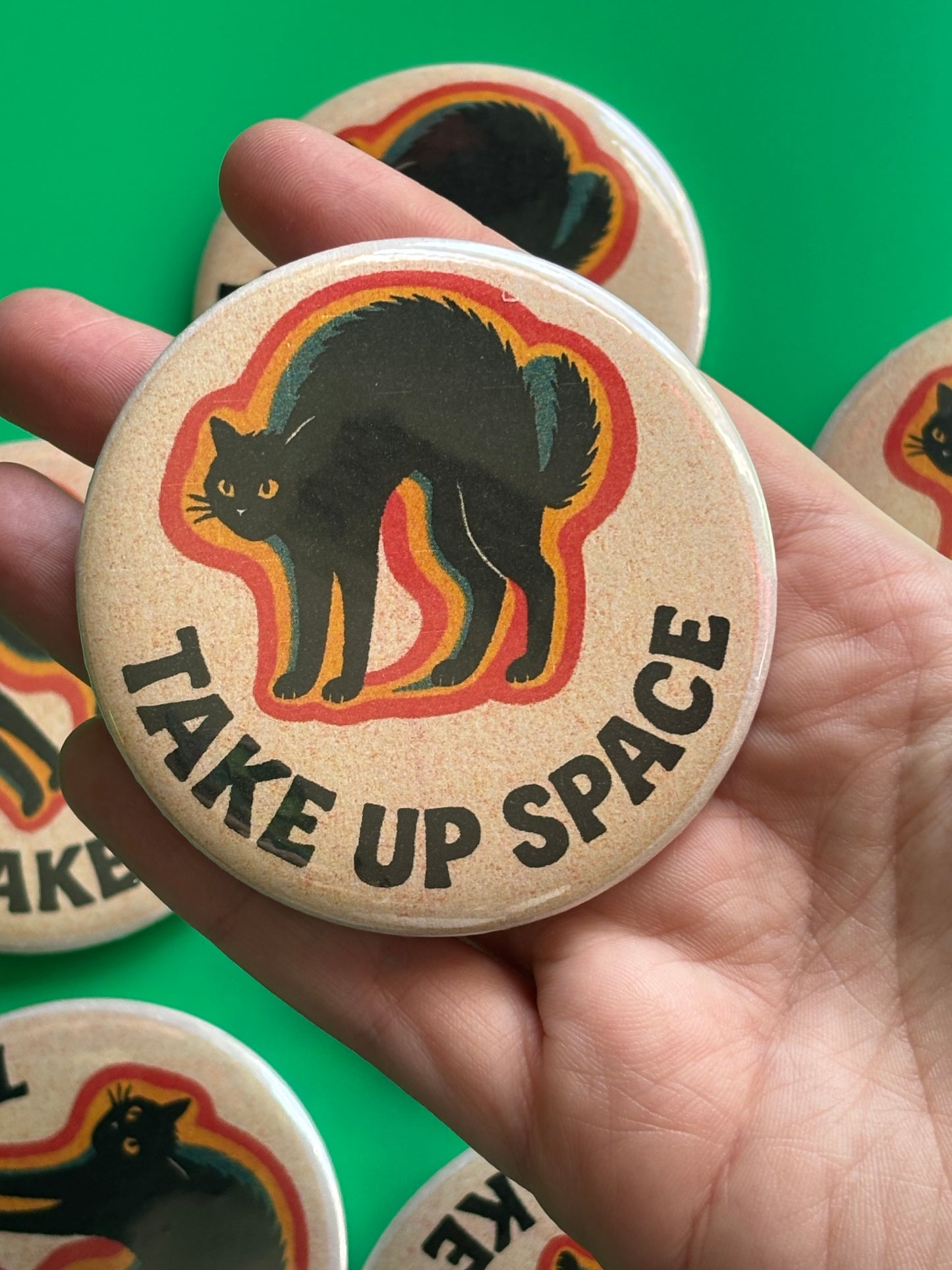 TAKE UP SPACE pinback button, 3 inches risograph style illustration